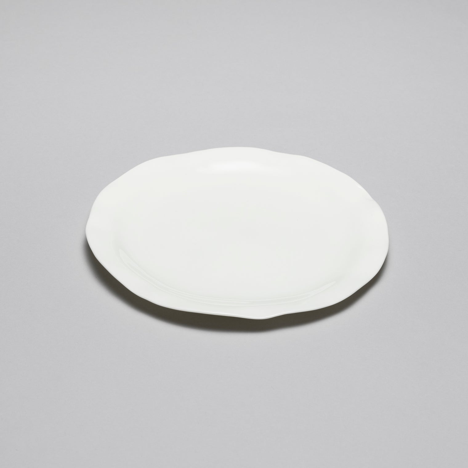 Round Sun Dinner Plate, 24cm x H1.8cm, Design by Roos Van de Velde