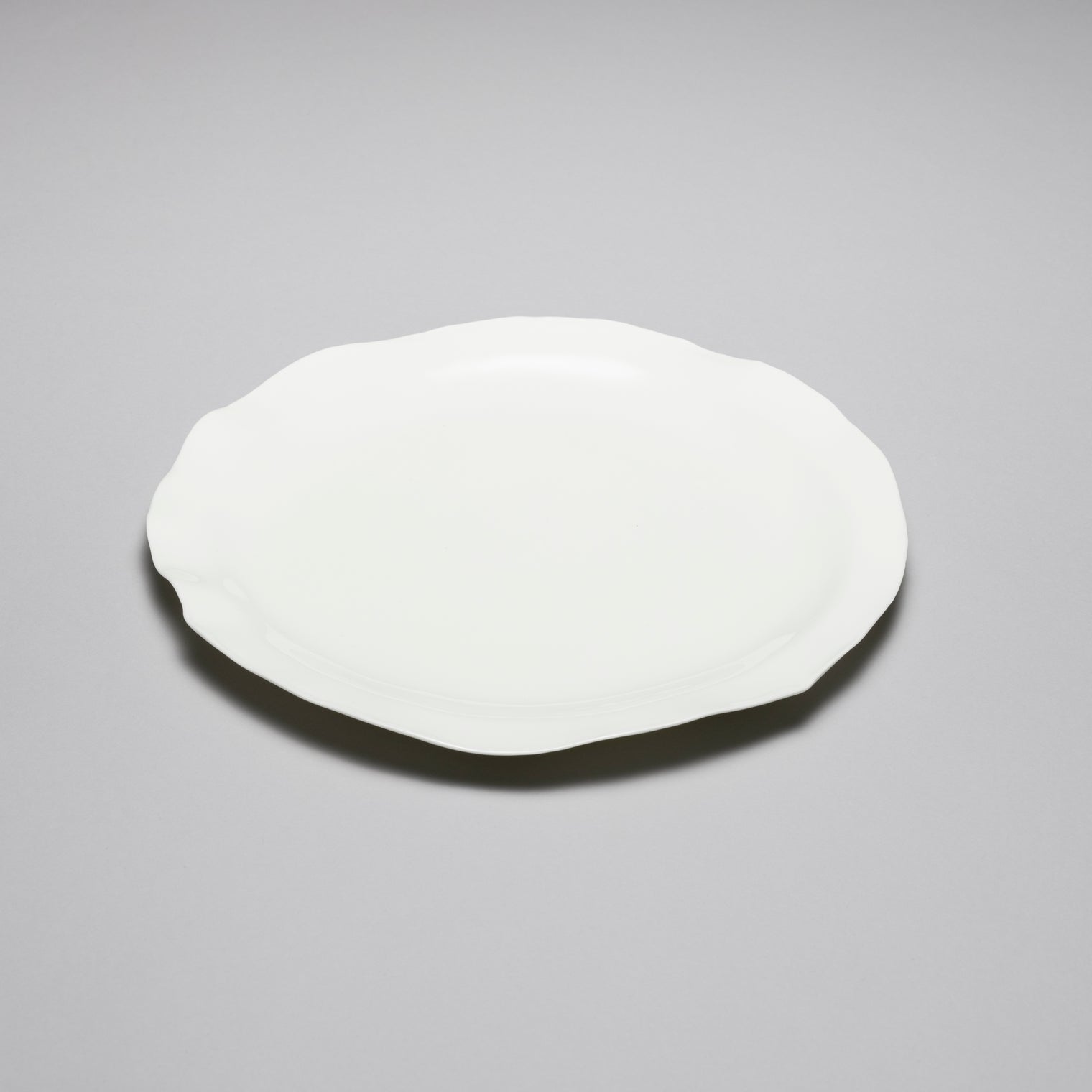 Round Sun Dinner Plate, 30.5cm x H2cm, Design by Roos Van de Velde